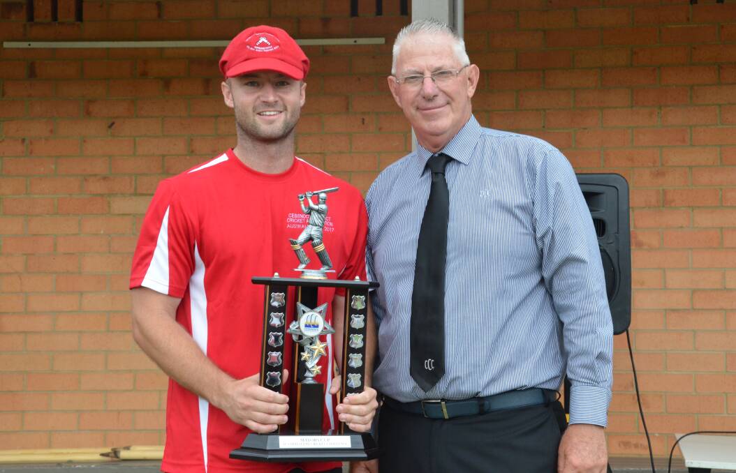WINNER: Cessnock District Cricket Association rep team captain Brent Watson collects the inaugural Mayoral Cup trophy from Cessnock mayor Bob Pynsent on Australia Day 2017.