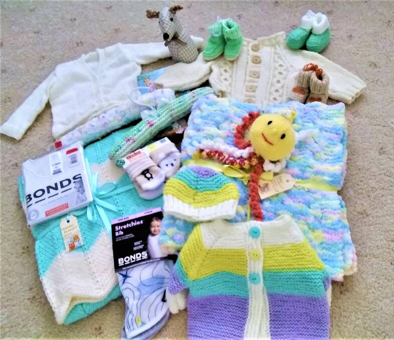 PRIZE: Some of the items that will be included in the baby gift basket.