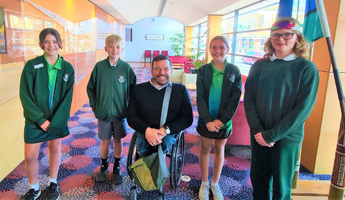 GUEST: Branxton Public School leaders Ruby, Leyton, Natasha and Angus with Kurt Fearnley at the School Leaders Breakfast in Cessnock on Monday. Picture: Mel O'Connor