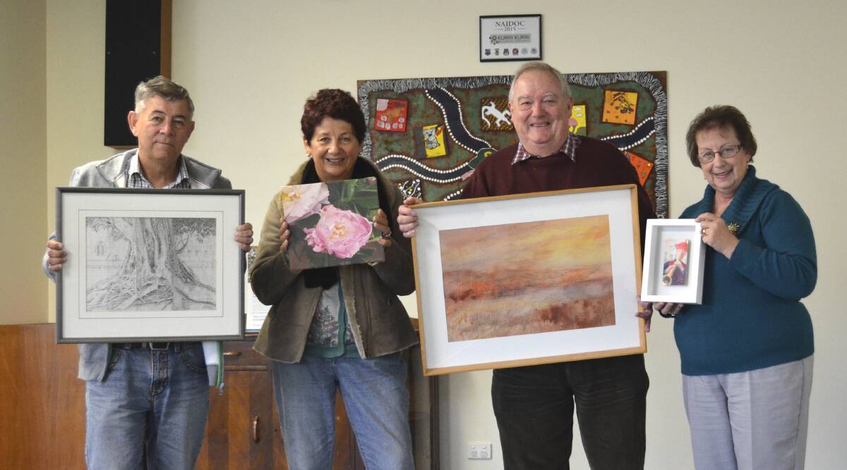 NEW HOME: Town of Murals Art Show committee members Bill Holland, Julie Pyke, Graham Smith and Sharon Dyson-Smith at Kurri Kurri Community Centre, where the art show will be held in September. Picture: Chelsea Harrison