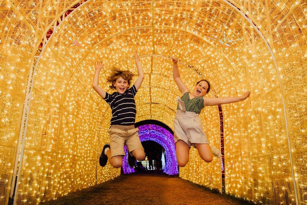 JUMPING FOR JOY: The Christmas Lights Spectacular boasts more than three million lights across a number of walk-through exhibits and interactive attractions.