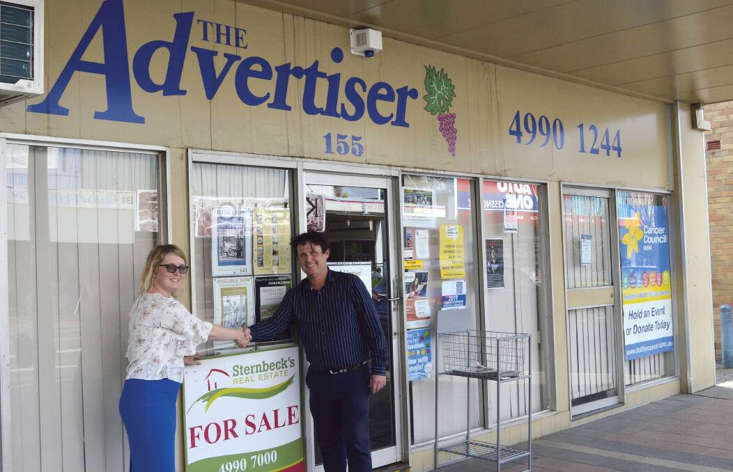 ON THE MOVE: Advertiser senior journalist Krystal Sellars with Michael Cleaves from Sternbeck's Real Estate, the selling agent for the building.