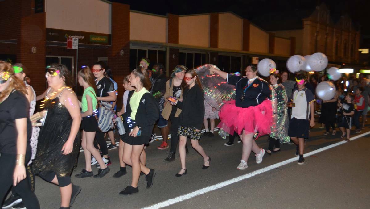 WILD AND WINDY: Last Friday's wind didn't deter hundreds of people from attending Cessnock's Spring Awakening festival.