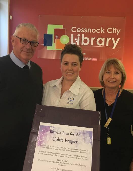 DROP-OFF POINT: Cessnock mayor Bob Pynsent with Lauren Gray from Hunter River Olaves and library services coordinator Rose-marie Walters at Cessnock Library, where bras can be dropped off for the Uplift Project until early November.