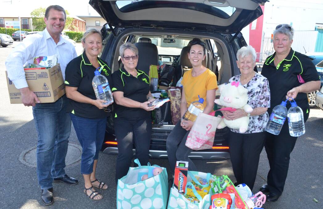 BOOTLOAD: Clayton Barr, Cathy Sheedy, Judy Morris, Bianca Judd, Joy Manning and Christine Marko load up the donations for the Little Juddies last Thursday. Picture: Krystal Sellars