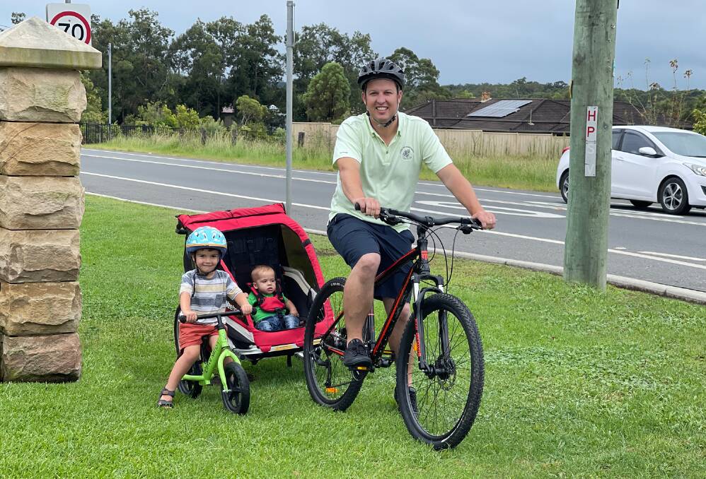 CONNECTIVITY: Cessnock mayor Jay Suvaal takes his sons Ethan and Caleb for a ride along Wine Country Drive.