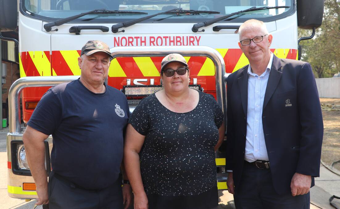 THANK YOU: North Rothbury Rural Fire Brigade volunteers Brett Douglas and Kelly Knox met with Cessnock mayor Bob Pynsent after last month's bushfire emergency.