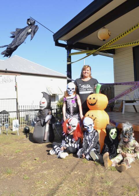 SCARY: Bellbird resident Brandi Livermore and some of her grandchildren ready for the Halloween maze to open on Thursday evening. Picture: Krystal Sellars