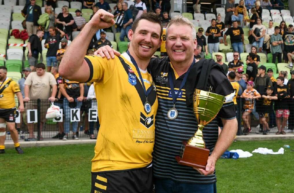VICTORY: Todd Edwards with Goannas captain Reed Hugo after last year's grand final win. Picture: Smart Artist