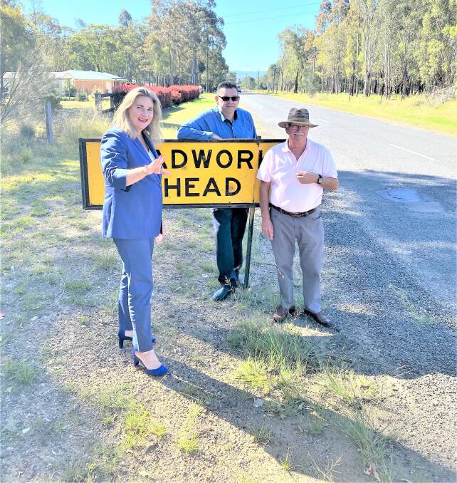 MUCH-NEEDED: Patron Senator for the Hunter Region, Hollie Hughes with Cessnock Liberal councillors Paul Dunn and Rod Doherty on Camp Road, Greta, which will undergo urgent repairs funded by the federal Roads to Recovery program.