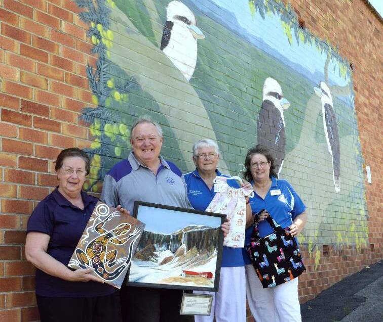 CREATIVE: Sharon Dyson-Smith, Graham Smith, Ann James and Debbie Rowley with some of the pieces that will be on show at the festival, in front of a mural that will be part of the walking tours.