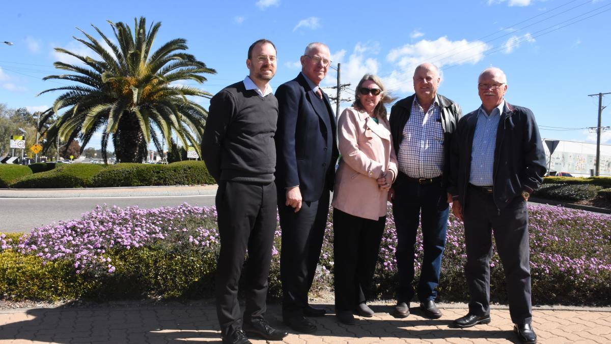FUNDING: Cessnock City Council senior strategic planner Iain Rush, Mayor Bob Pynsent, Hunter Region Business Hub general manager Kerry Hallett, Towns with Heart's Toby Thomas and Ward D councillor Rod Doherty in Kurri Kurri CBD, which will undergo a $4.17 million facelift.