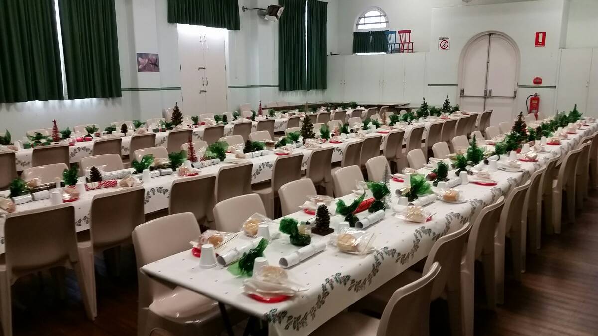 LARGE GATHERING: Wesley Hall set up for the Cessnock Christmas Christian Day Luncheon in 2016. The volunteer-run event has served free Christmas lunch for up to 170 people in previous years.