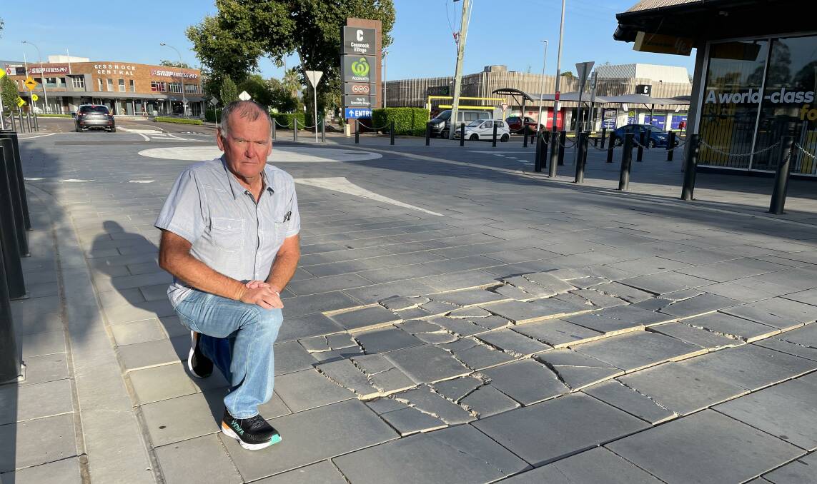 'MAJOR PROBLEMS': Cessnock councillor Ian Olsen in Cooper Street, where another section of pavers has started to crack.