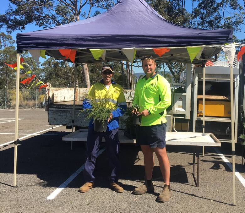 INITIATIVE: Cessnock City Council outdoor staff Tom Cook and Jordan McFayden with some of the plants residents who have recently built or bought a new home could receive.
