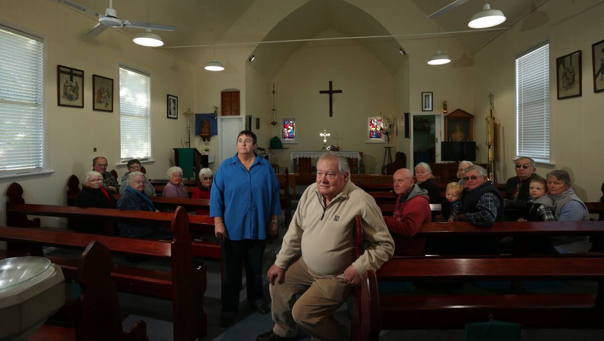 COMMUNITY HUB: Cessnock councillor Anne Sander and rector's warden Graham Smith and parishioners at St Mary's Anglican Church, Weston. Picture: Simone De Peak