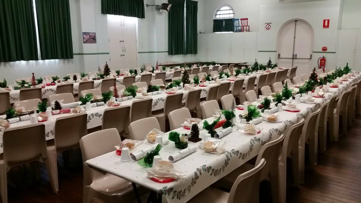 JAM-PACKED: Wesley Hall set up for the Cessnock Christmas Christian Day Luncheon in 2016. The volunteer-run event has served free Christmas lunch for up to 170 people in previous years.