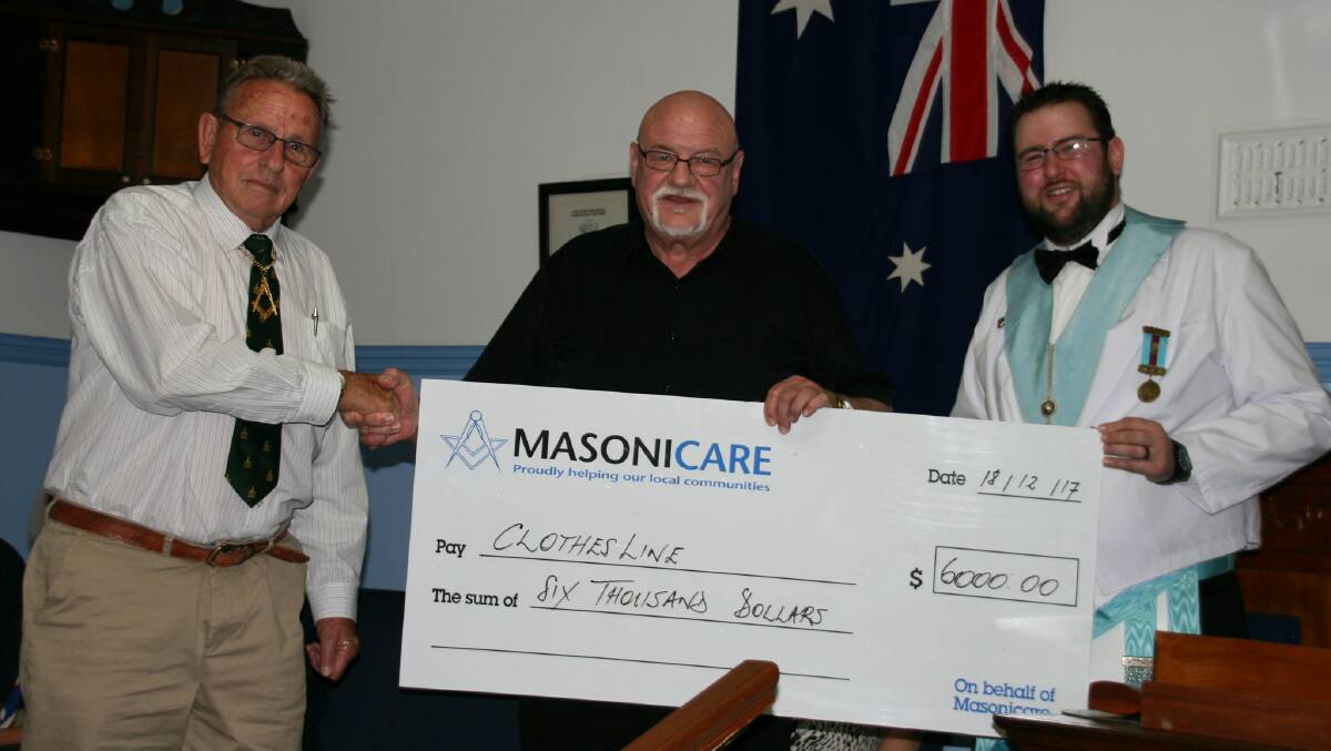 COMMUNITY SUPPORT: Freemasons' Assistant Grand Master of NSW, Bill Driver; ClothesLine CEO Steve Cowie, and Masonic Lodge Tomalpin's Lodge Master, W Bro Mitchell Perrin at the presentation evening on December 18. Picture: supplied