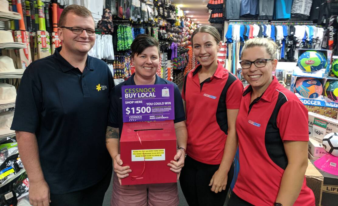 EXCITING PROMOTION: Cessnock Chamber of Commerce president Clint Ekert with Sportspower Cessnock staff Tara Herring, Jess Simpson and Inga Connors, excited to be involved in the Buy Local campaign.