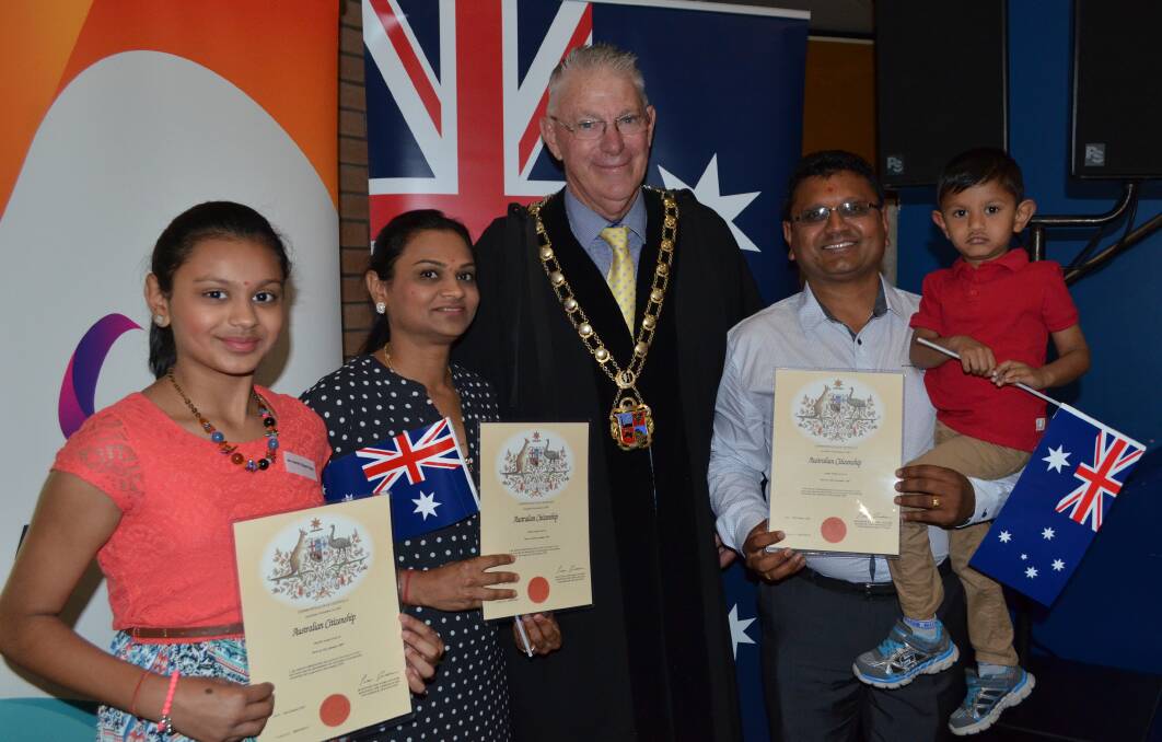 NEW CITIZENS: Harshi, Shilpa, Gopal and Kush Halai with Cessnock mayor Bob Pynsent on Australia Day. Picture: Krystal Sellars