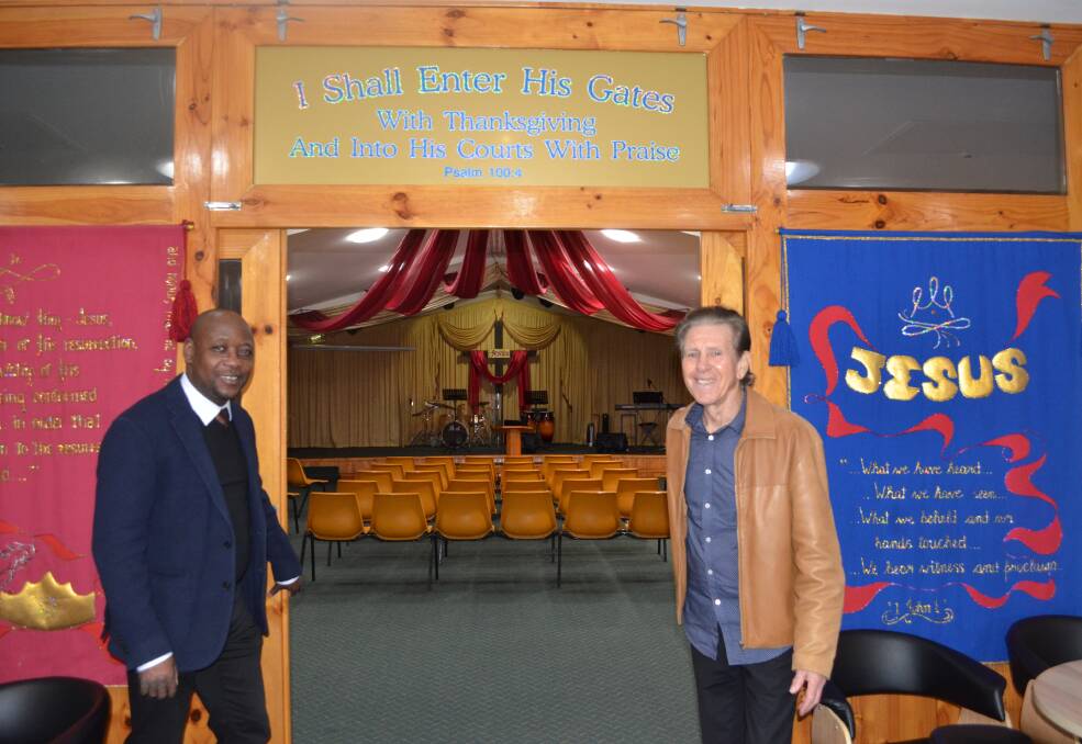 DOORS OPEN: Cessnock City Church assistant pastor Dr Kunle Fowosere and senior pastor Wayne Kembrey welcome the community to join the church's 90th anniversary celebration on Sunday. Picture: Krystal Sellars