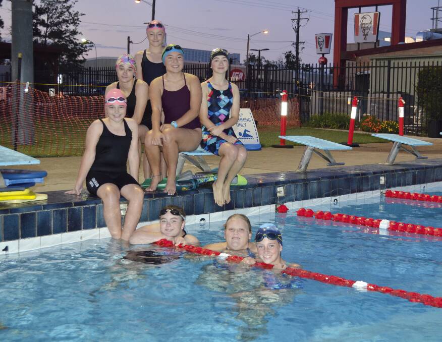 SUPPORT: Bethany Joyes, Kayla Germyn, Abigail Glover, May Webster, Phebe Glover, Isabella Metcalfe, Tanikah Barber and Claire Bridge are taking part in Laps For Life at Cessnock Pool during March. Picture: Krystal Sellars