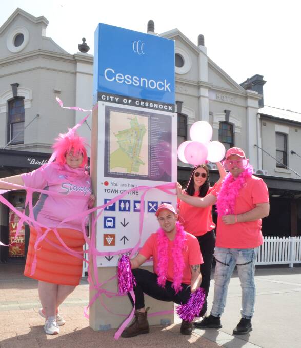 SUPPORT: Cessnock Pink Up Your Town committee members in front of Peden's Hotel, which will light up in pink to support the campaign.