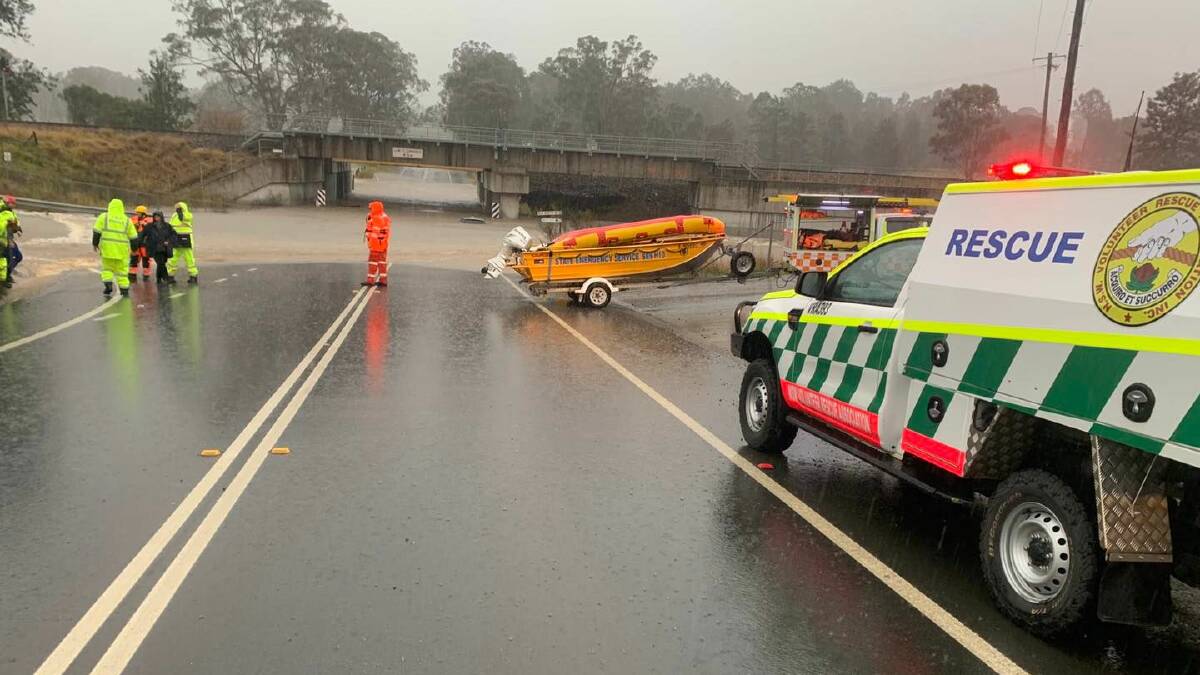 INUNDATED: Lovedale Road at the railway underpass on Sunday afternoon. Picture: Cessnock District Rescue Squad
