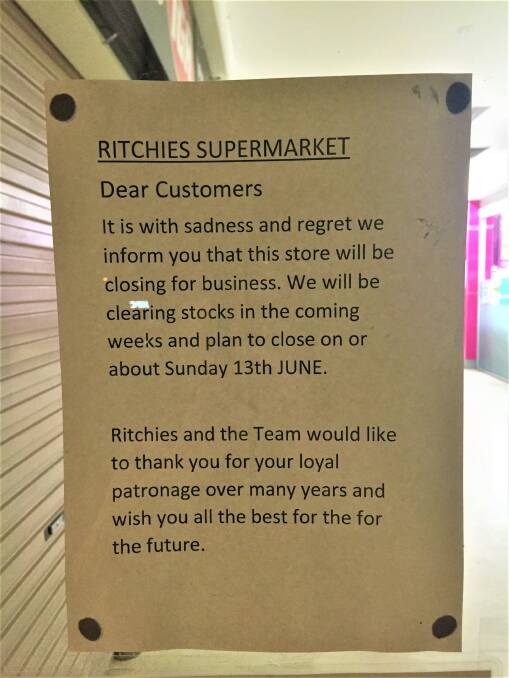 SAD DECISION: A sign posted in Kingsway Plaza informing customers that Ritchies Kurri Kurri supermarket is closing down.
