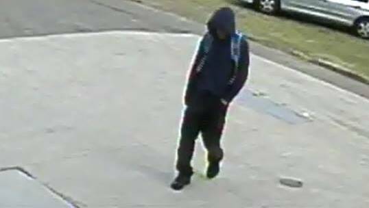 INVESTIGATION: Police would like to speak to the person depicted in this CCTV image about an alleged attempted armed robbery at a Bellbird service station on Wednesday morning.