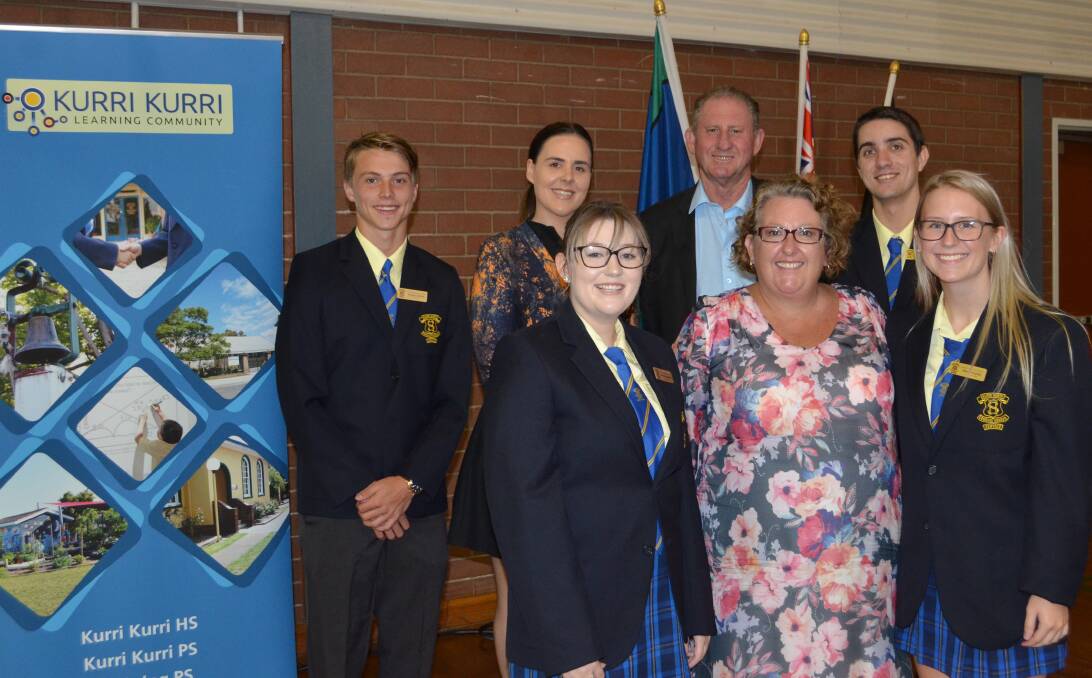 PIctured at back, Kurri Kurri High School captain Angus Lathan, Chloe Riall and John Hewitt from Telstra, and vice-captain Rhys Field; and at front, captain Georgia Dembeck, principal Tracey Breese and vice-captain Olivia Boyles.