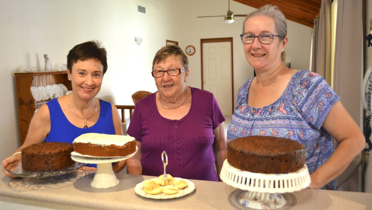 YUM: CWA Cessnock members Ellice Schrader, Glenys Thomson and Gemma Lawler are looking forward to the group round of The Land Cookery Competition on March 14.
