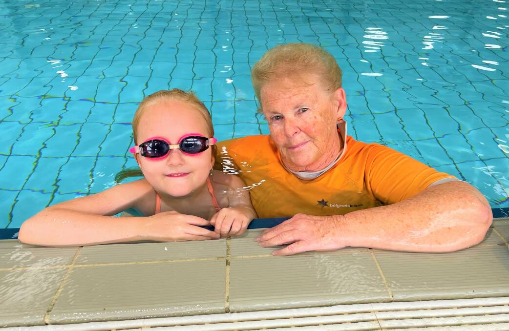 HONOUR: Well-known Cessnock swimming instructor Ellena Morris (pictured with Stella Mascord at Kurri Aquatic Centre) has been nominated for the NSW Women of the Year awards. Picture: Krystal Sellars