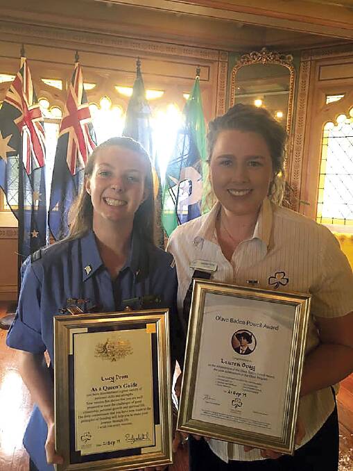 ACHIEVEMENT: Cessnock Girl Guides' Lucy Donn, with her Queen's Guide award, and Lauren Gray, with her Olave Baden-Powell award at the ceremony at Government House on September 21.
