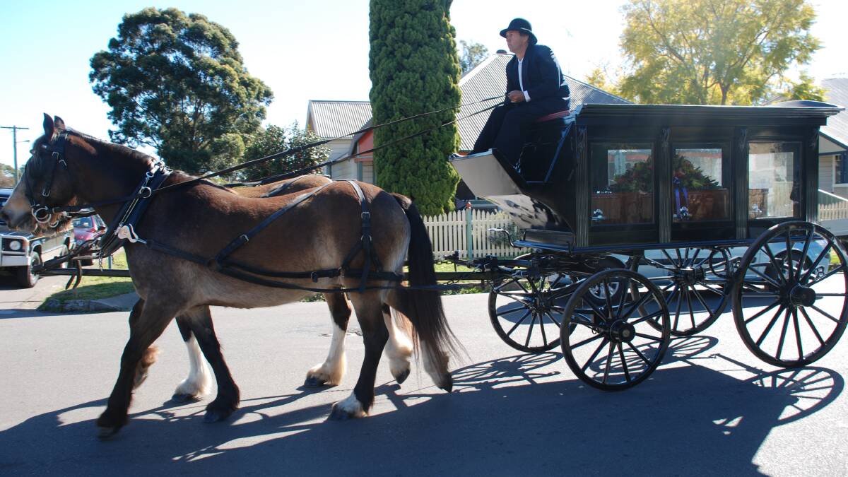 10 YEARS AGO: Reg Lindsay's casket was transported by horse and carriage to St John's Anglican Church, Cessnock for his funeral in August 2008.