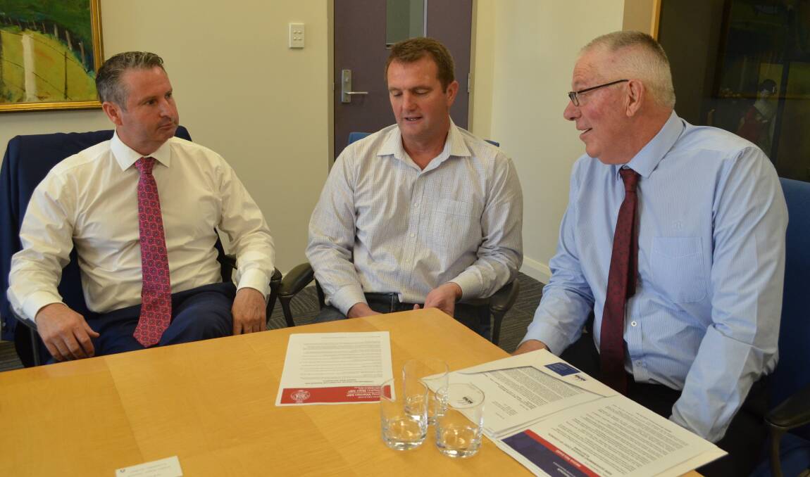DISCUSSION: Shadow minister for local government Greg Warren, Cessnock MP Clayton Barr (who is also the shadow minister for water) and Cessnock mayor Bob Pynsent at the council chambers on Thursday. 