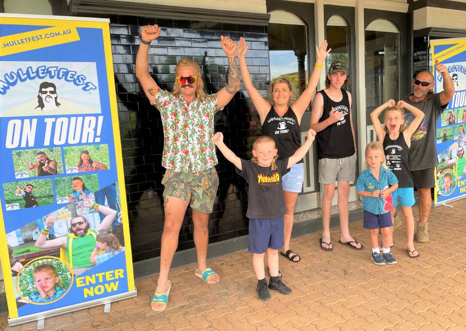 EXCITED: Mulletfest participants Liam Arnold, Beau Baker, organiser Laura Johnson, Leverett Hawkins, Dwight Mathews, Max Johnson and Paul Baker outside the Chelmsford Hotel, where the event will run this Friday to Sunday. Picture: Krystal Sellars