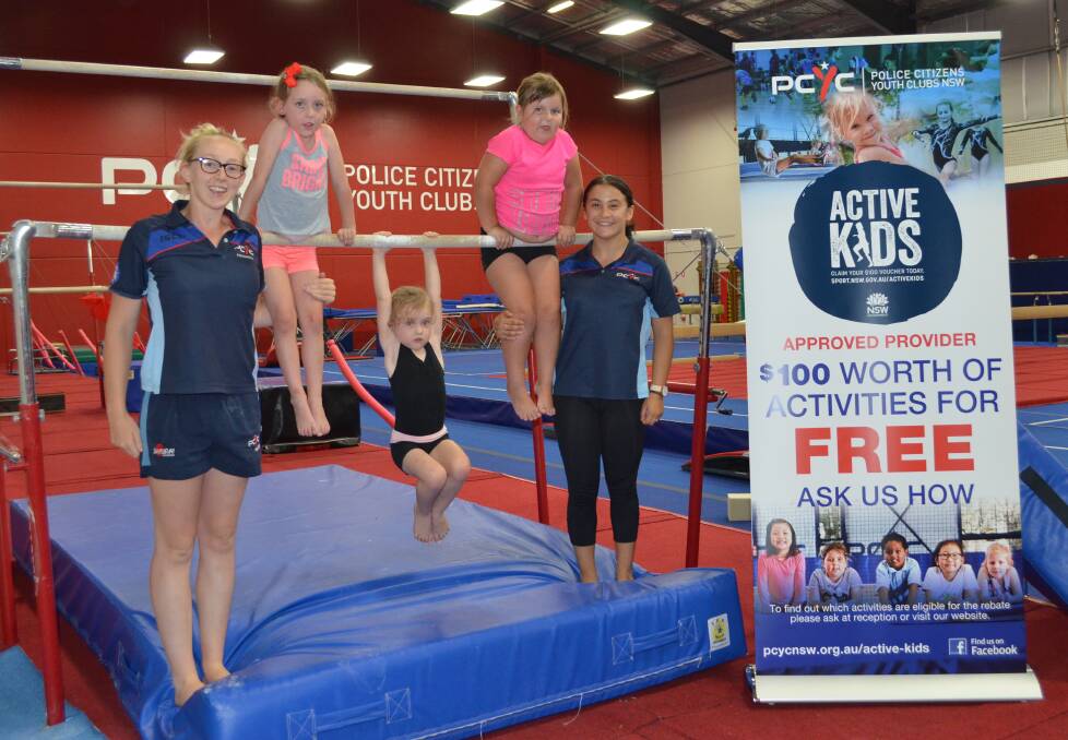 COME AND TRY: PCYC Cessnock gymnastics coach Emily Gibbs, with Ruby, Ella and Brittany, and coach Chelsea Hamid, ahead of the open day this Friday.