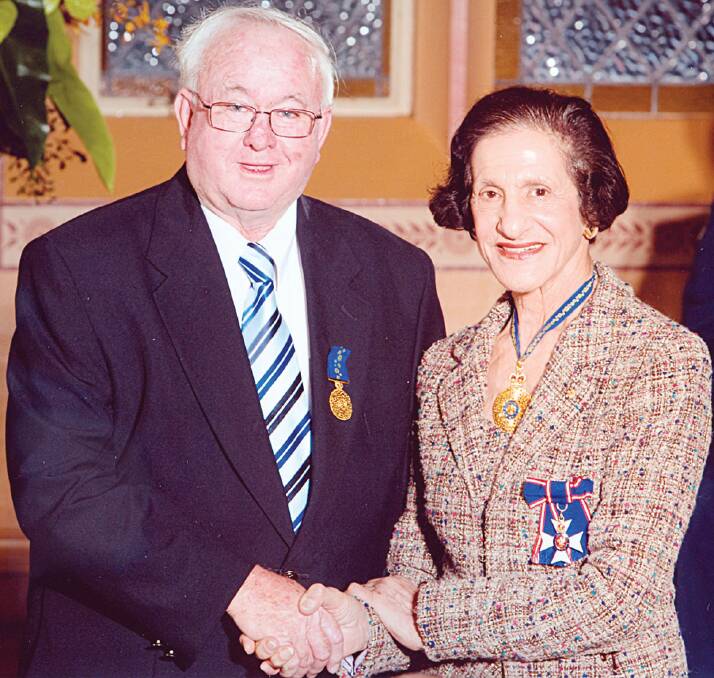 HONOUR: Brian Andrews receiving his Order of Australia Medal (OAM) from Governor of NSW, Marie Bashir in 2009.