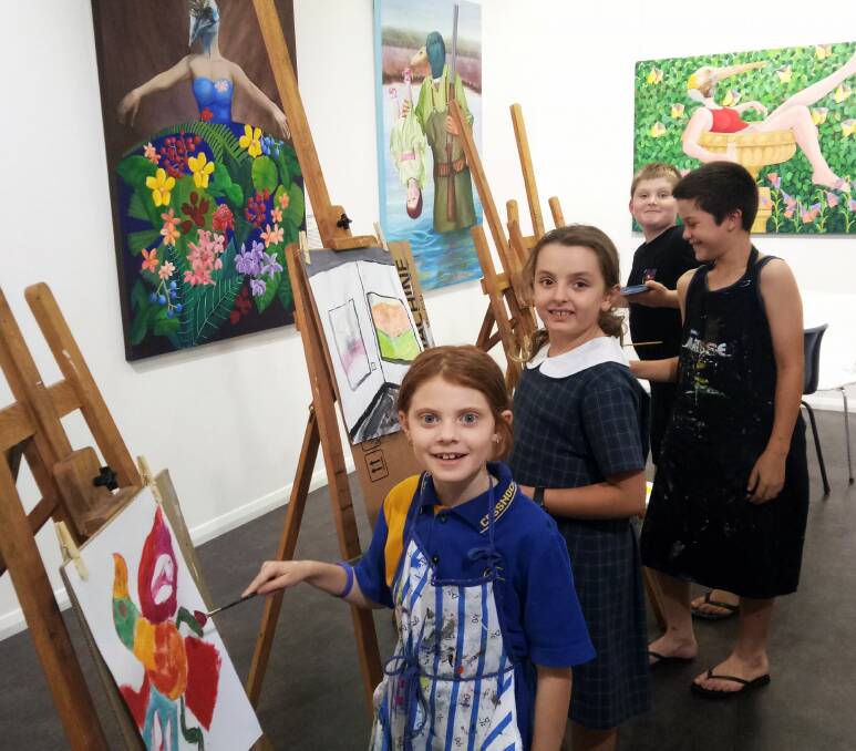 CREATIVE: Cessnock Regional Art Gallery children's art class students Lily, Annalisa, Corey and Cameron working on their pieces for the exhibition.