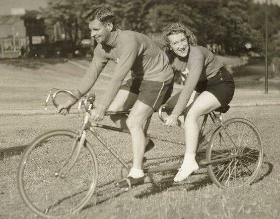Hubert Opperman and a woman on a tandem bike. Picture: Sam Hood, State Library of NSW