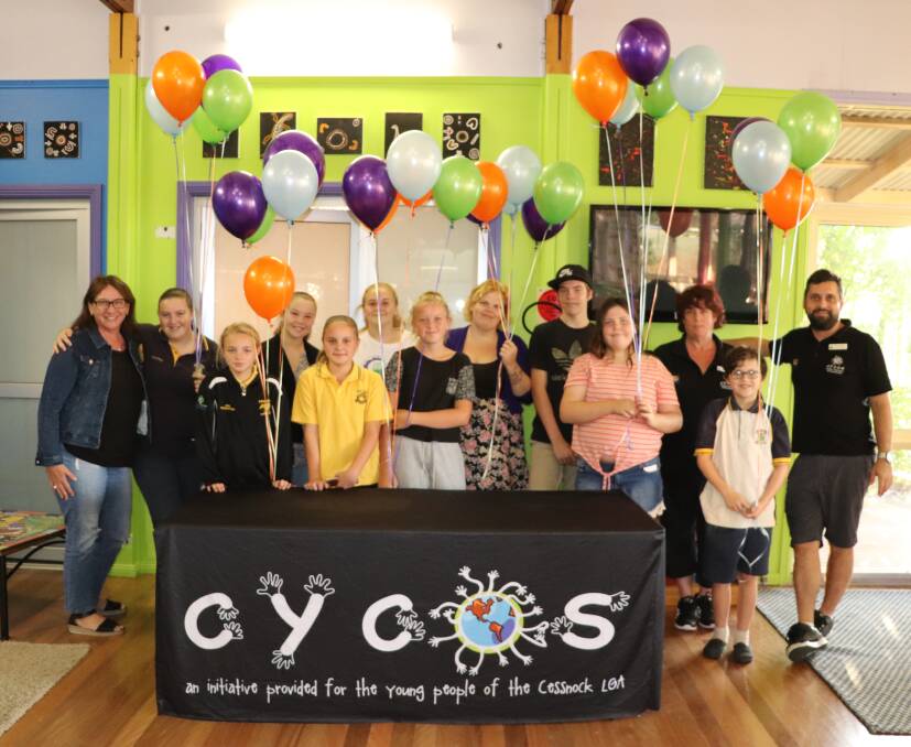 EXCITING MILESTONE: Cessnock Youth Centre and Outreach Service staff and local young people at the 20th birthday celebration on Wednesday.