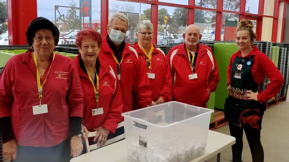 SUPPORT: Westpac Rescue Helicopter Service Cessnock Support Group volunteers at the prize draw for their recent raffle at Bunnings Warehouse Cessnock.