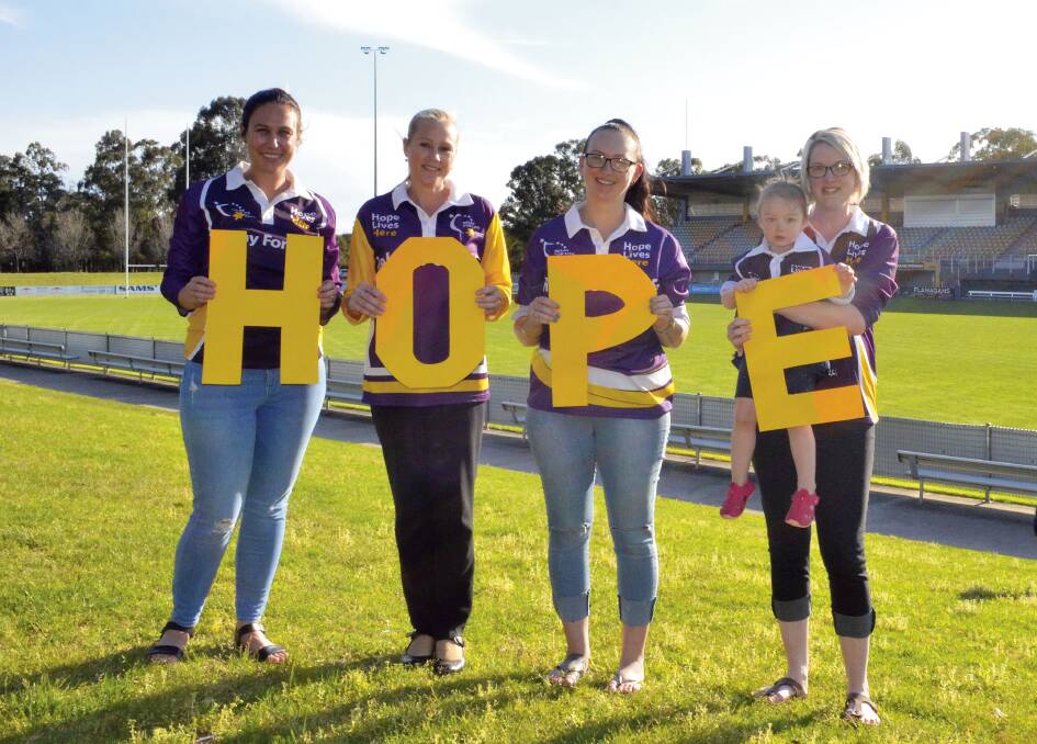 COMMON GOAL: Cessnock Relay For Life committee members Marlie Caban, Katrina Radnidge, Cassi Ponchard and Emma Ekert (and her daughter Grace) at Baddeley Park, where the relay will be held on November 10. Picture: Krystal Sellars