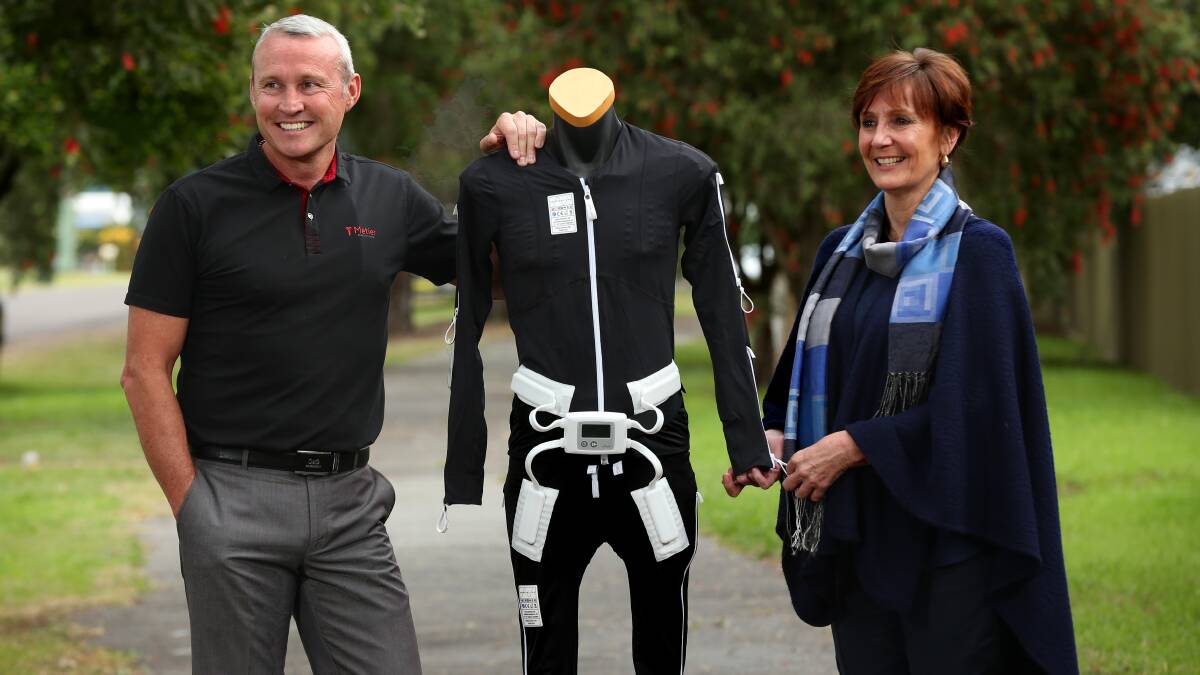 EXCITING TIME: Métier Medical directors Grant Howells and Jan Wayland with one of the Mollii suits.
Picture: Simone De Peak