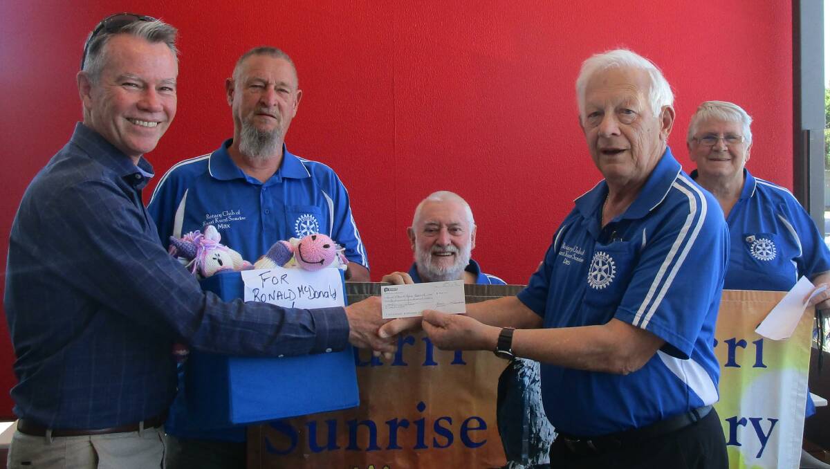 SUPPORT: Ronald McDonald House Northern NSW CEO Ross Bingham with Kurri Sunrise Rotary Club members Max Gruisinga, Col James, Des Mills and Ann James.