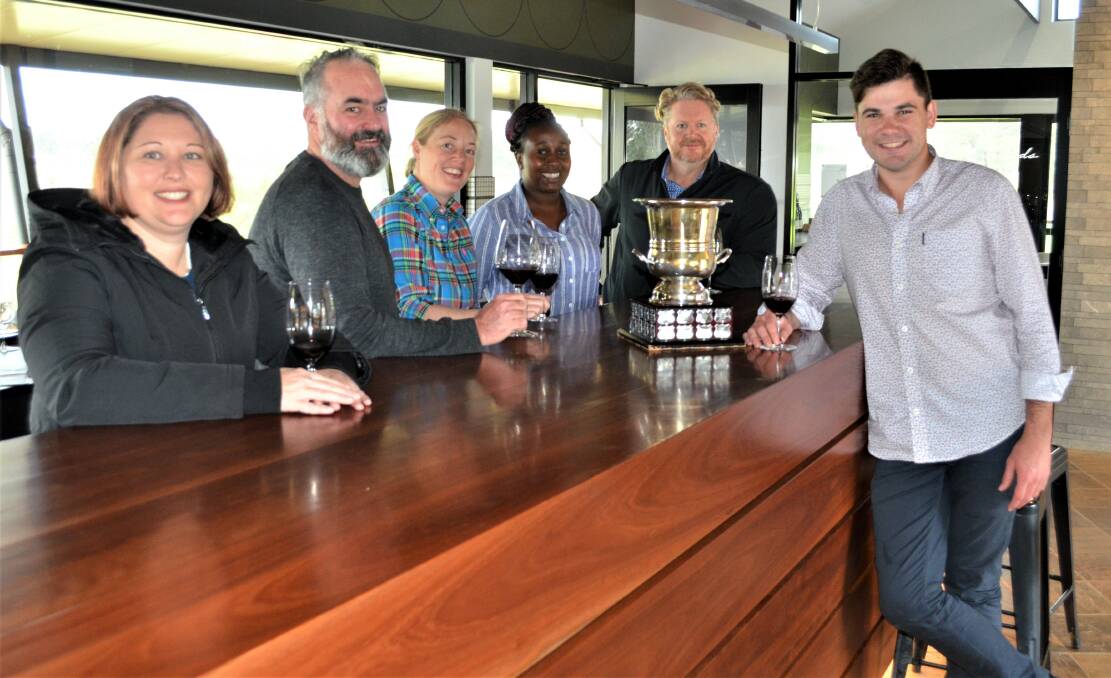WINNERS: Glandore Estate staff Sherin Lawlor, Duane Roy, Aimee McLennan, Diana Mutasa, Nick Flanagan and Lachlan Sinclair with the Hunter Valley Cellar Door of the Year trophy.