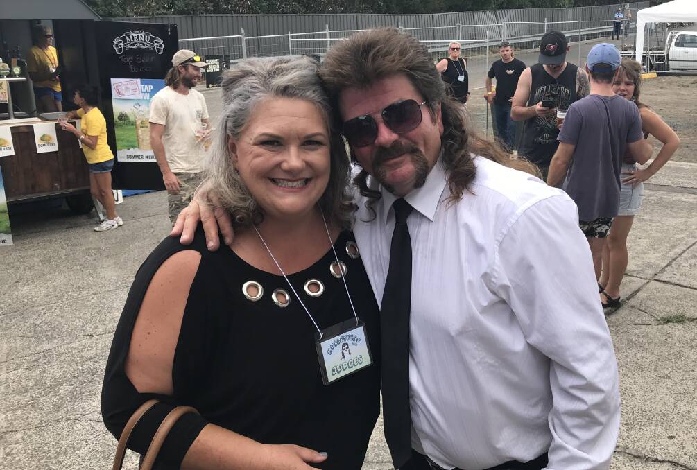 MIGHTY MULLETS: Member for Paterson Meryl Swanson with an entrant at Kurri Kurri's inaugural Mulletfest on Saturday. Picture: supplied