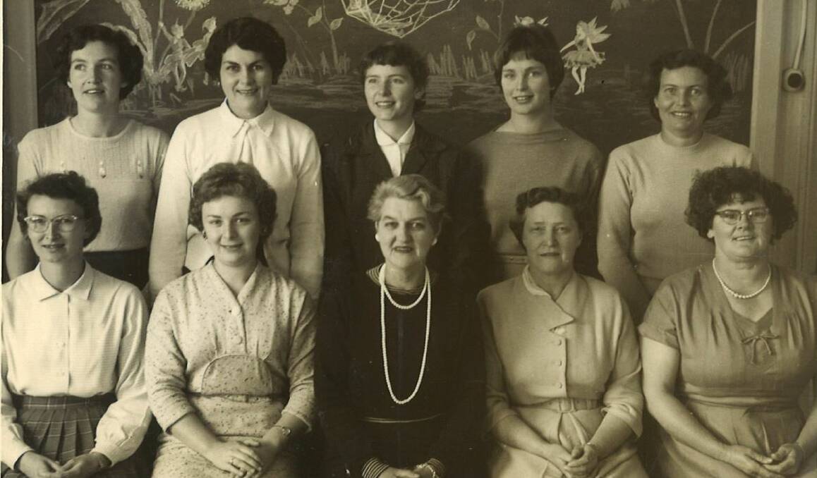 LEADER: Ivy Curtis, in the middle wearing pearls, as Head Mistress at Kurri Kurri Public School in the mid-1960s. Picture: Local Studies collection, Cessnock Library