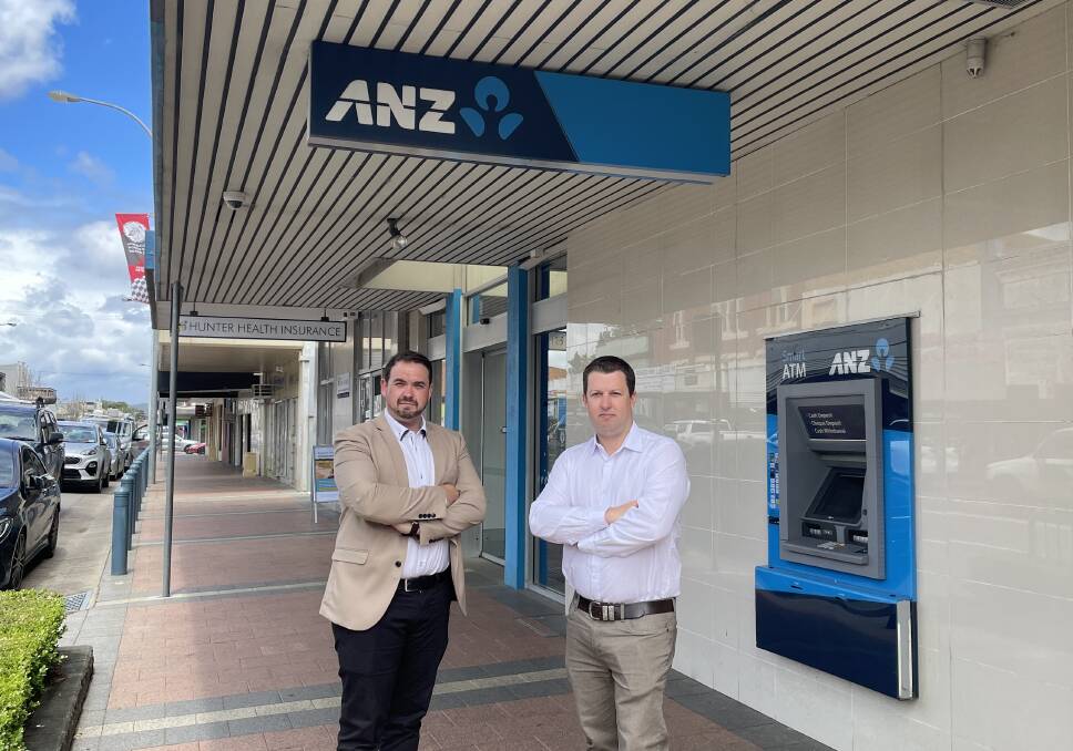 Cessnock town coordinator Anthony Burke and mayor Jay Suvaal outside the ANZ Cessnock branch, which is set to close in April 2023. Picture by Krystal Sellars.